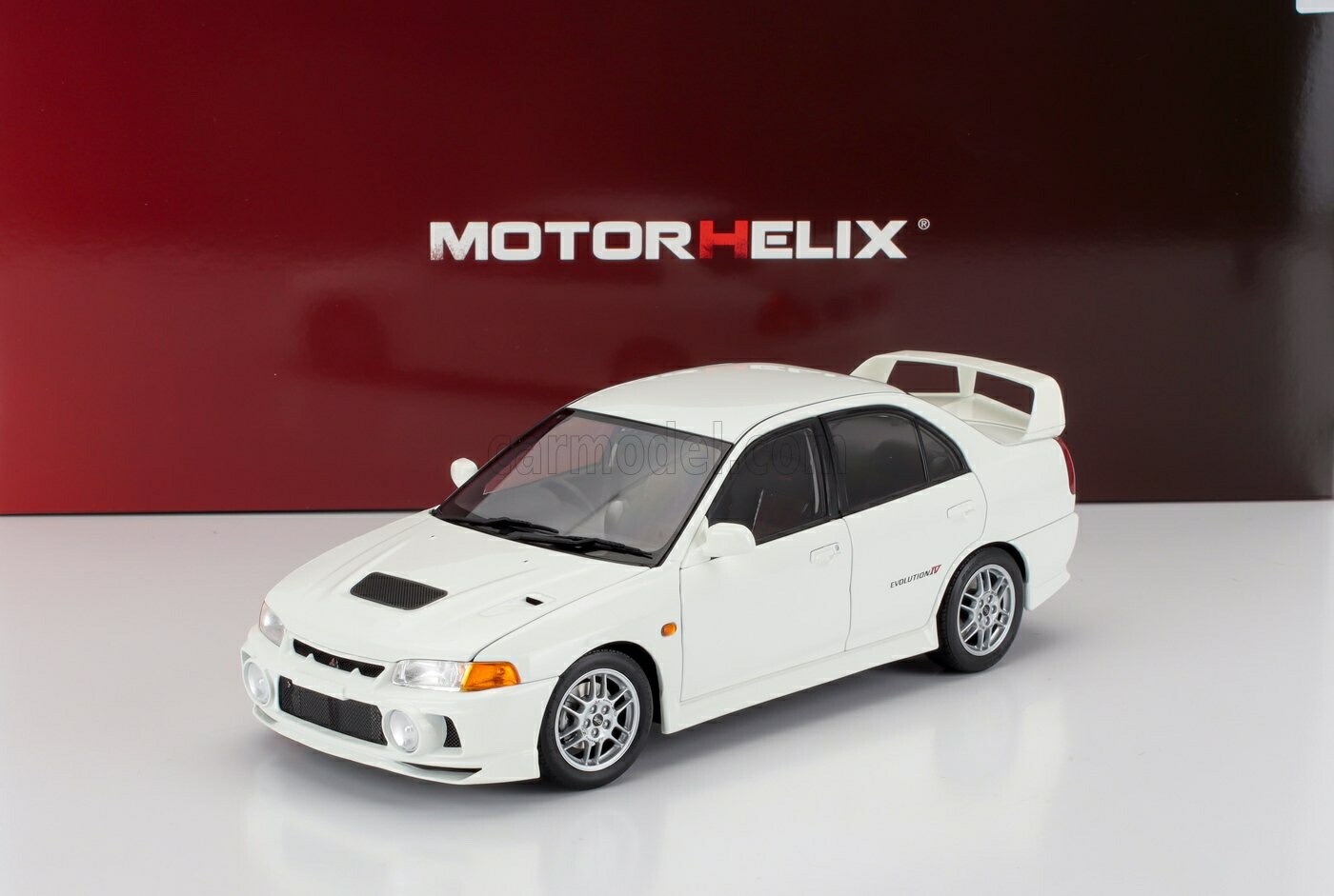 楽天市場】ミニカー 1/18 三菱 ランサー EVO MOTORHELIX 1/18