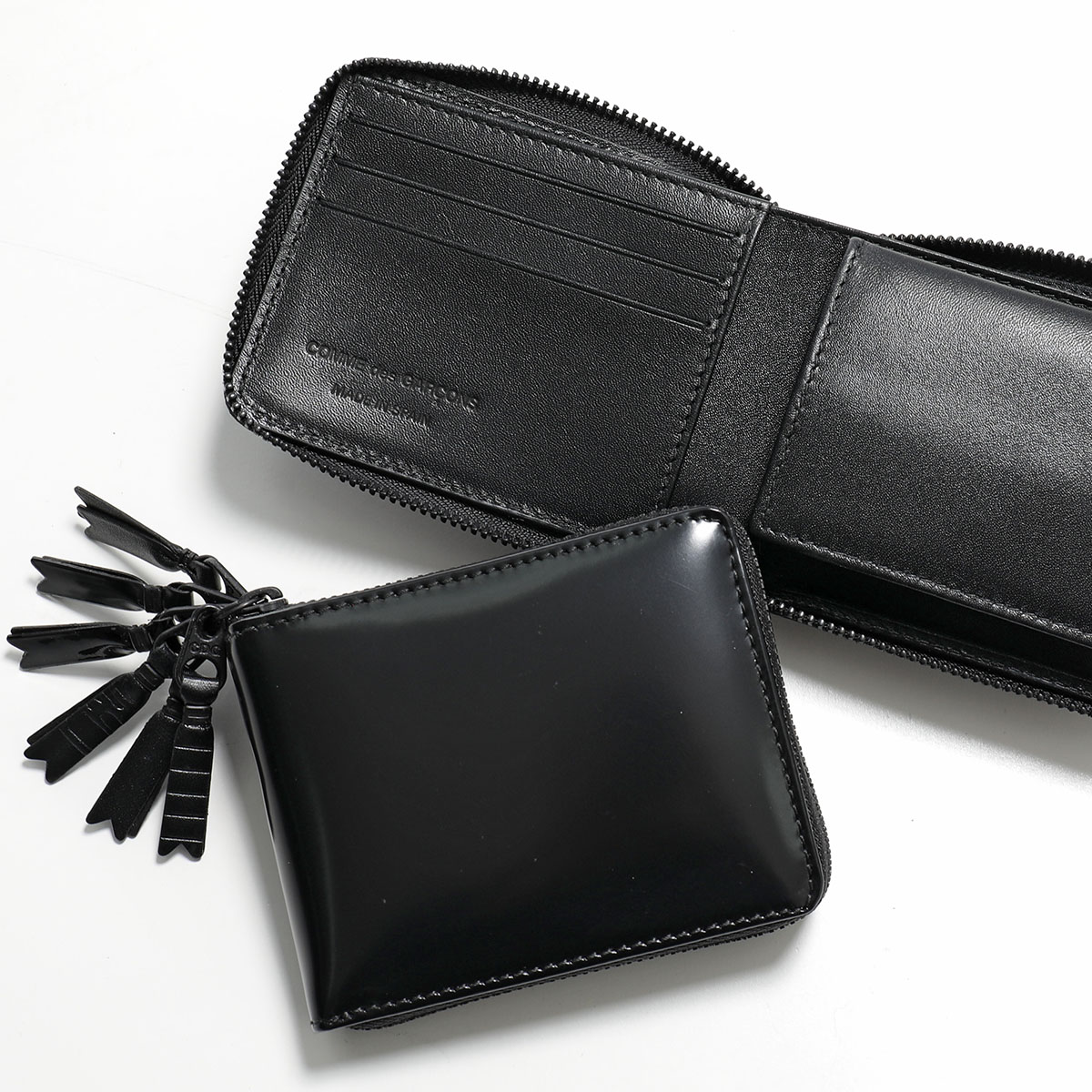 楽天市場】COMME des GARCONS コムデギャルソン 二つ折り財布 ZIPPER