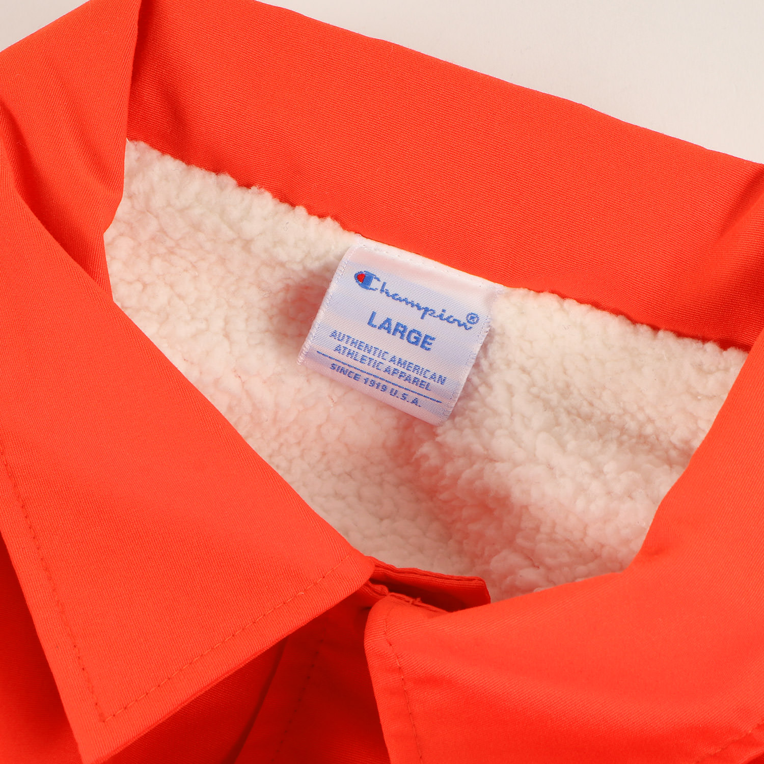 XLARGEギャルヒップビッグプリントくすみオレンジ裏ボアコーチ