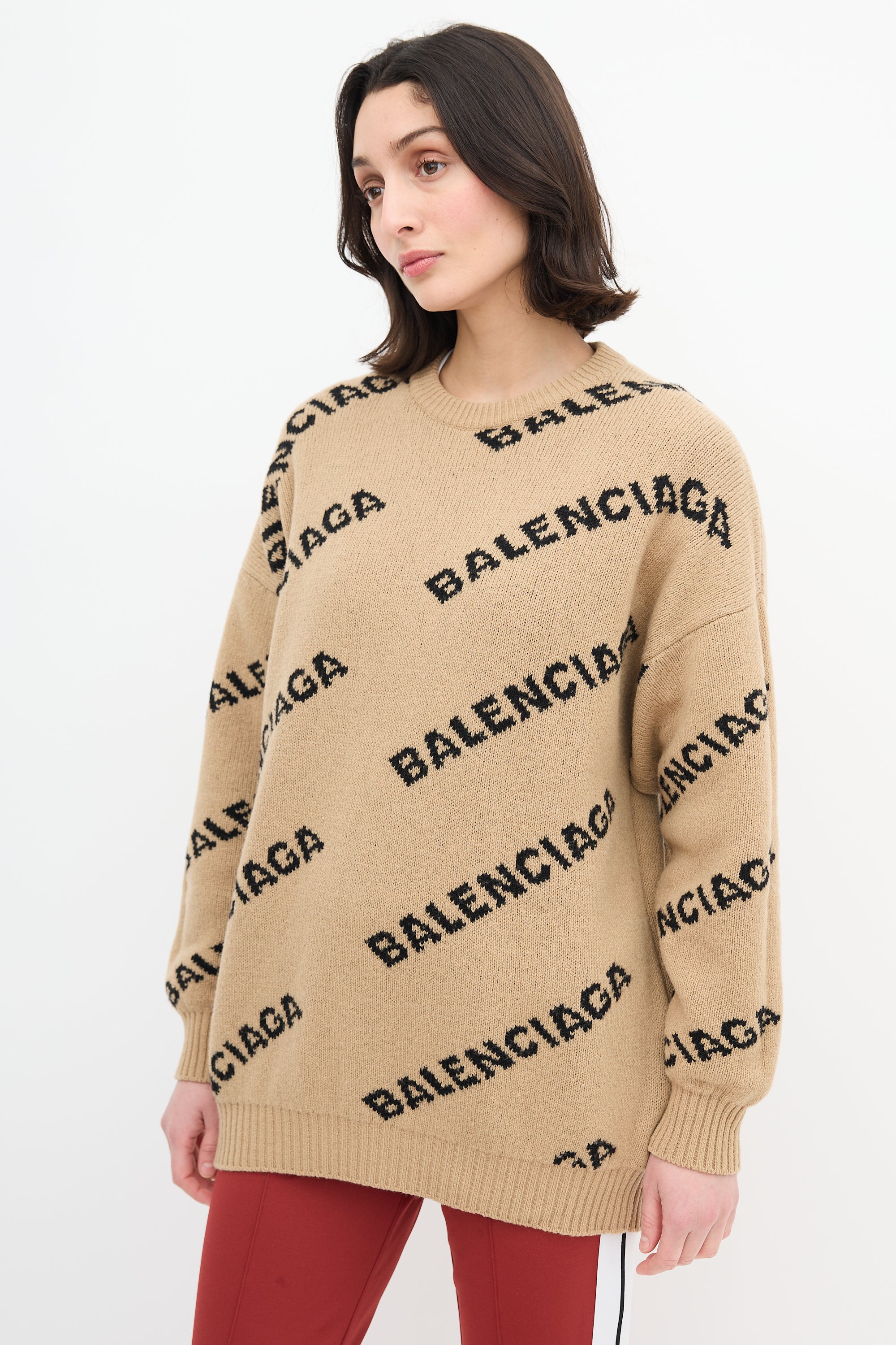 Balenciaga // Beige & Black Reversible Allover Logo Sweater – VSP