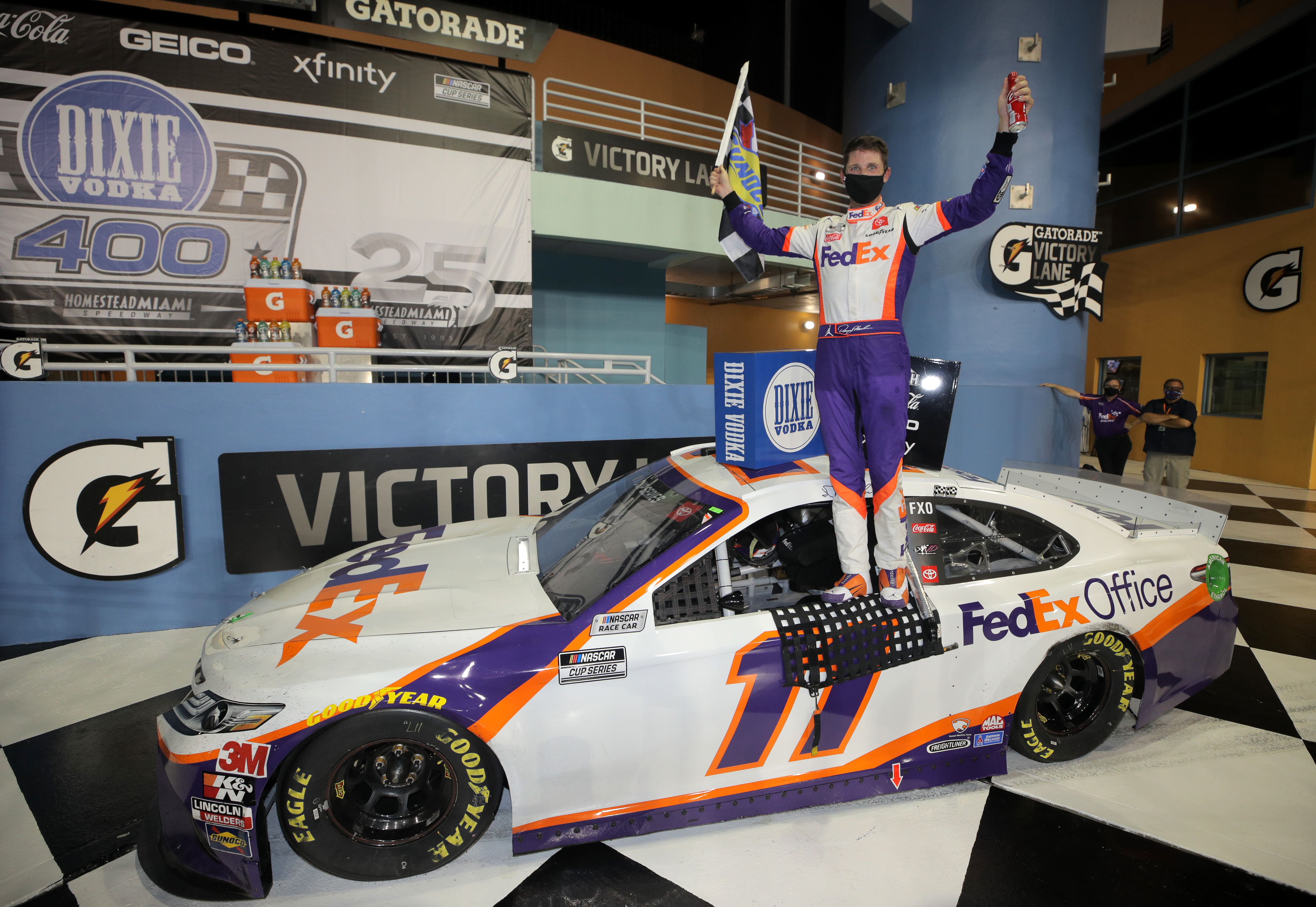 Denny Hamlin wins Dixie Vodka 400 after several delays at