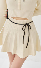 予約商品】ウエストオープンリボンデザインニットミニワンピース