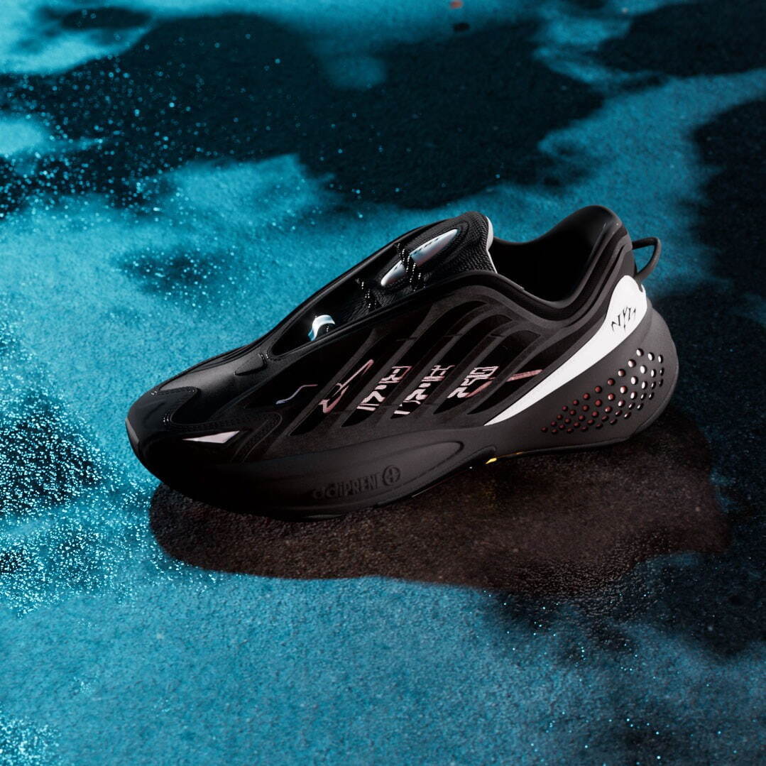 アディダス オリジナルス×グッチメイズのスニーカー、光で浮かび上がる