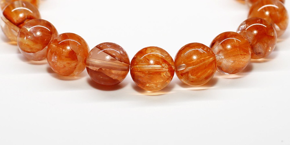 ライモナイトインクォーツブレスレット（約10mm玉・オレンジレッド