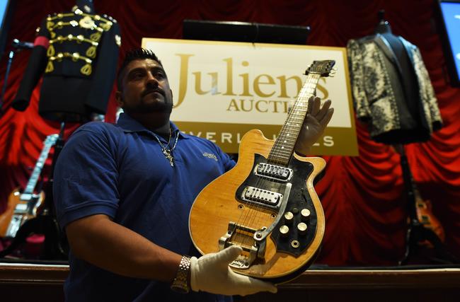 ジョージ・ハリスンのギター 米ニューヨークの競…：伝説のお宝ギター