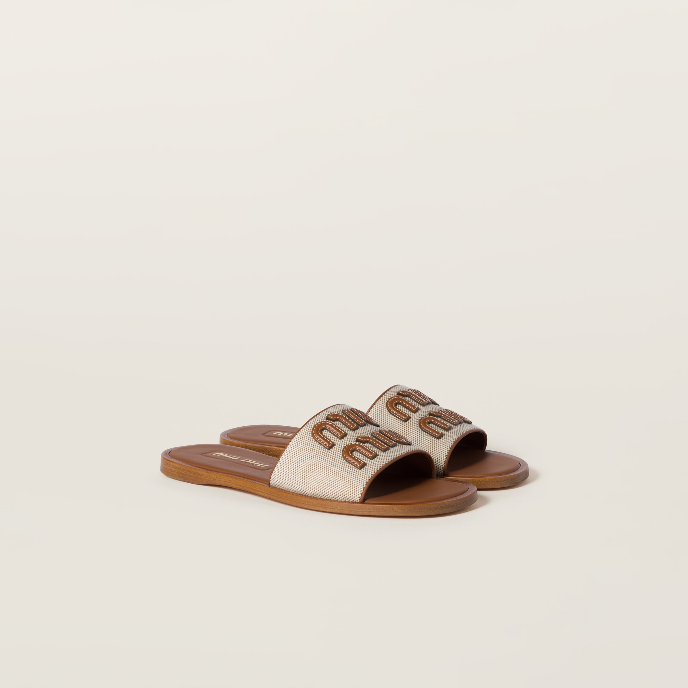 Briarwood Matelassé Nappa Leather Slides | Miu Miu