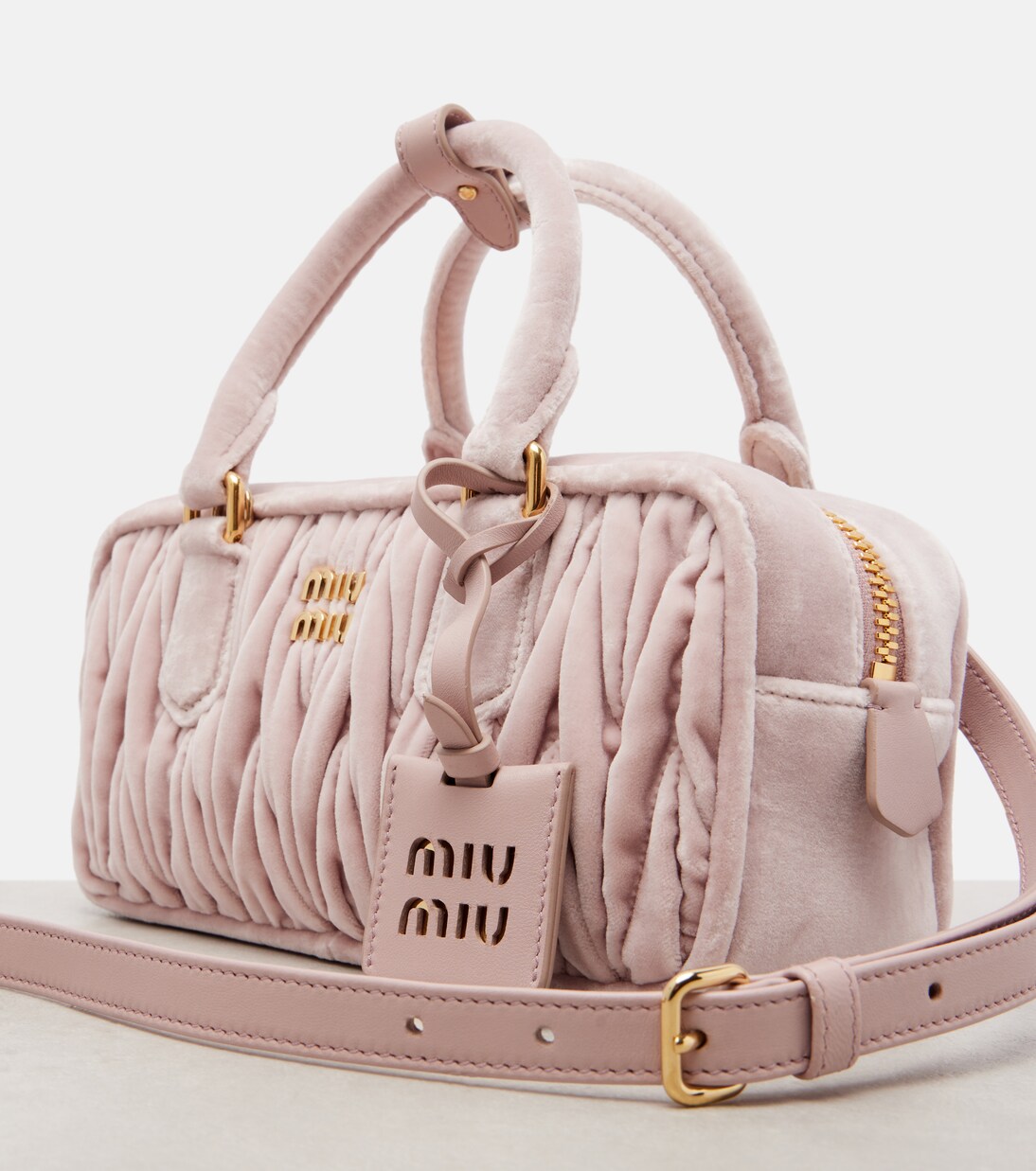 Arcadie Small suede top-handle bag in pink - Miu Miu | Mytheresa