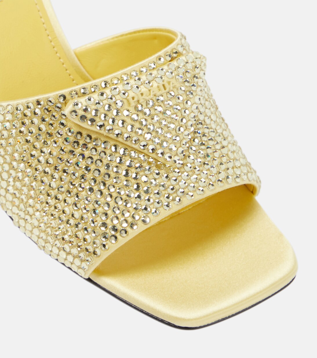 Crystal-embellished satin mules in yellow - Prada | Mytheresa