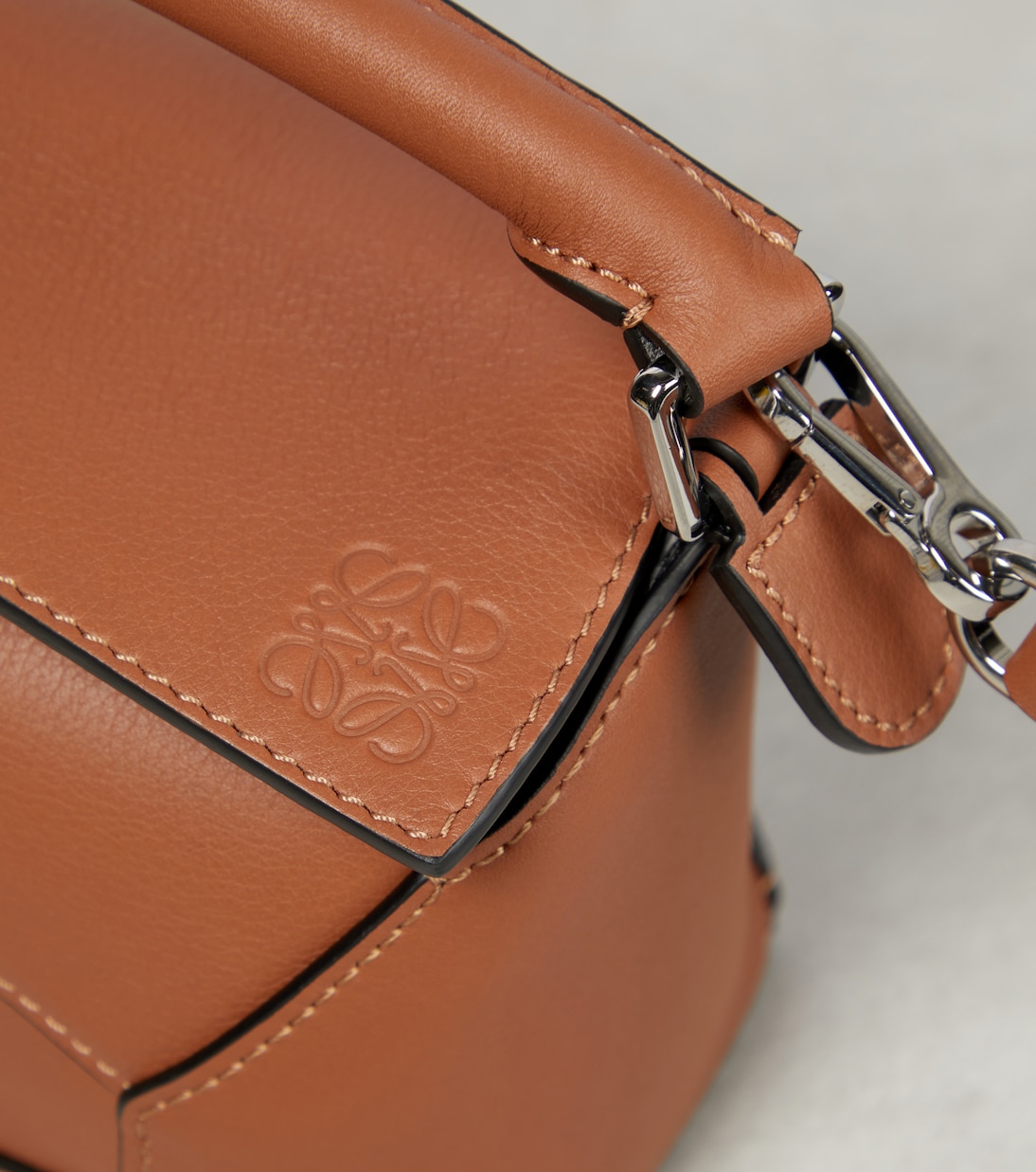 Puzzle Edge Mini leather tote bag in brown - Loewe | Mytheresa