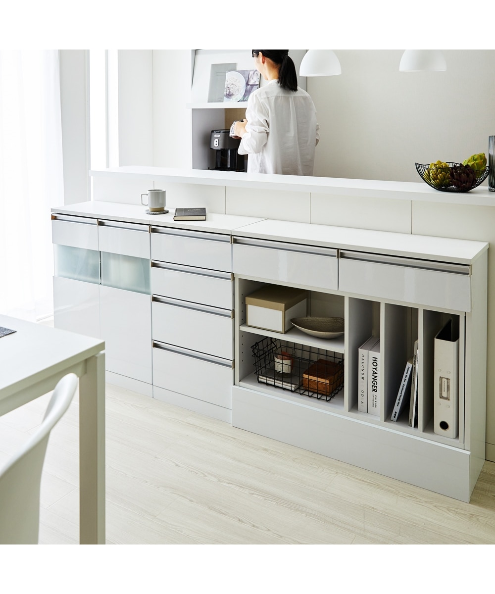 デスクとしても使える！鏡面仕上げの伸縮カウンター下収納【幅40~223cm