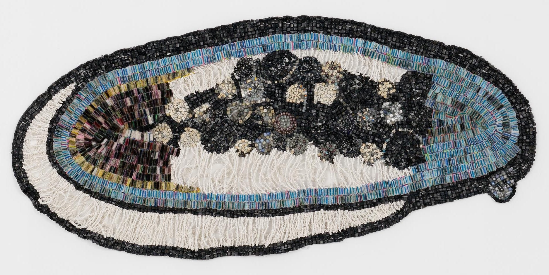 From Computer Keys and Bottle Caps, Moffat Takadiwa's Tapestries