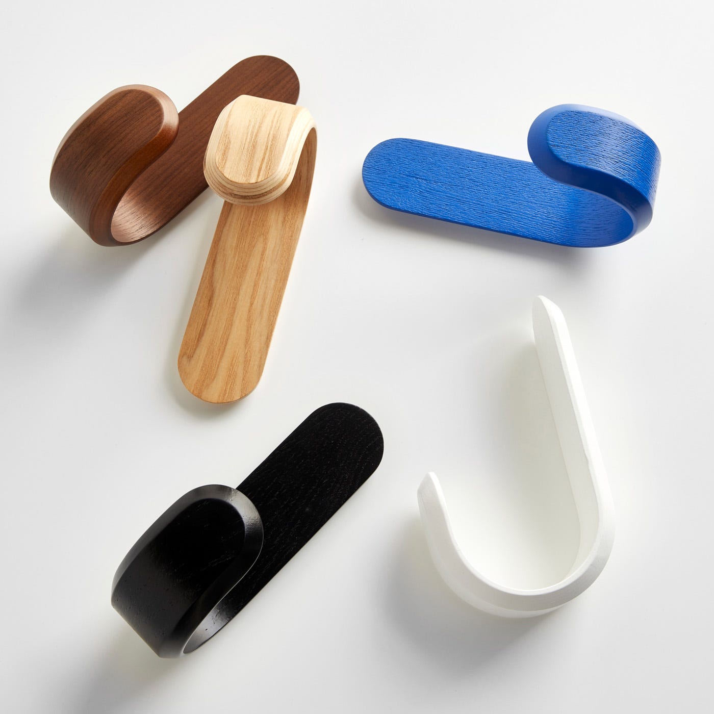 Curve White Wall Hook by Normann Copenhagen | Unison