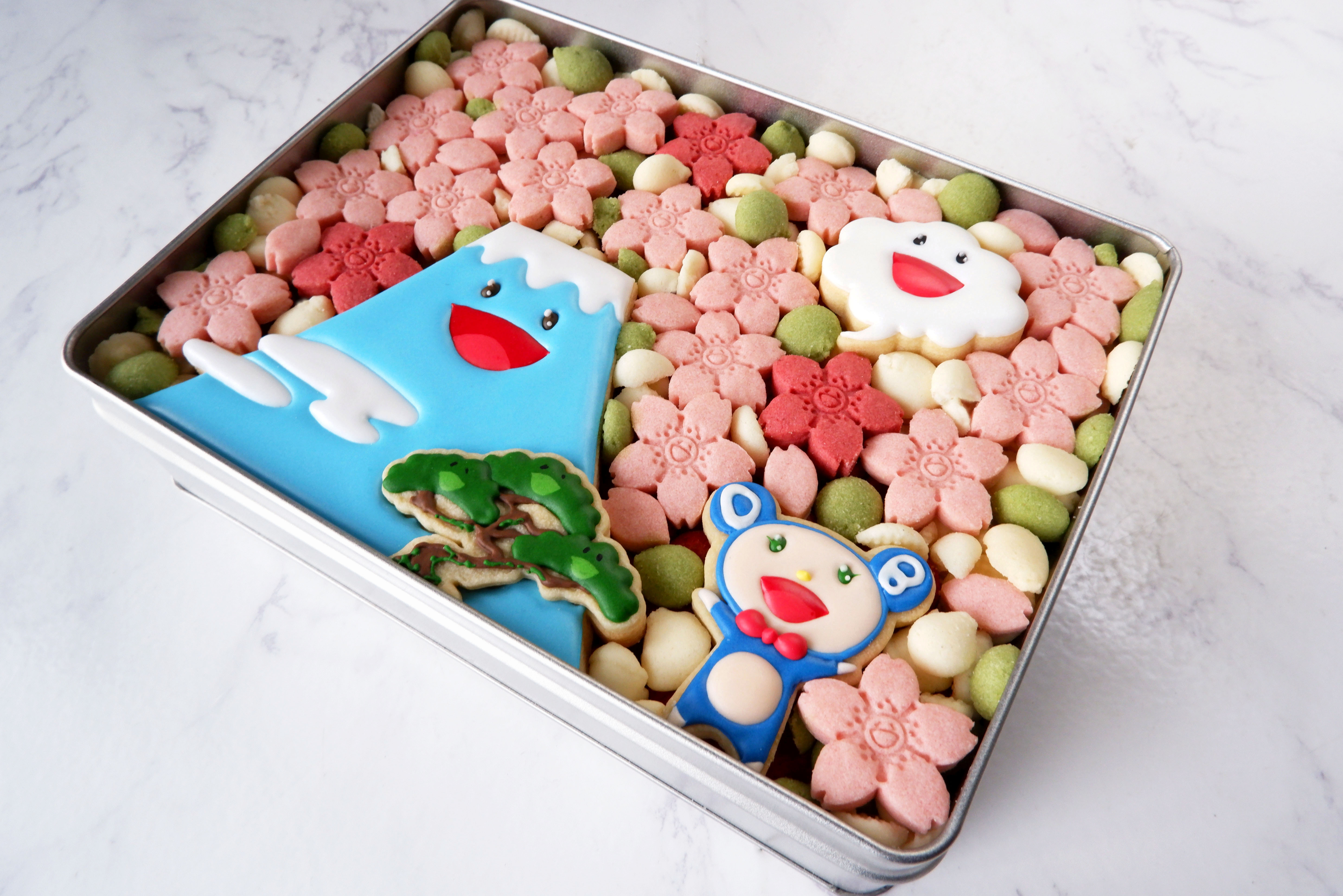 2月28日(火)12:00より、「DOBくんのお花見クッキー缶」を予約販売