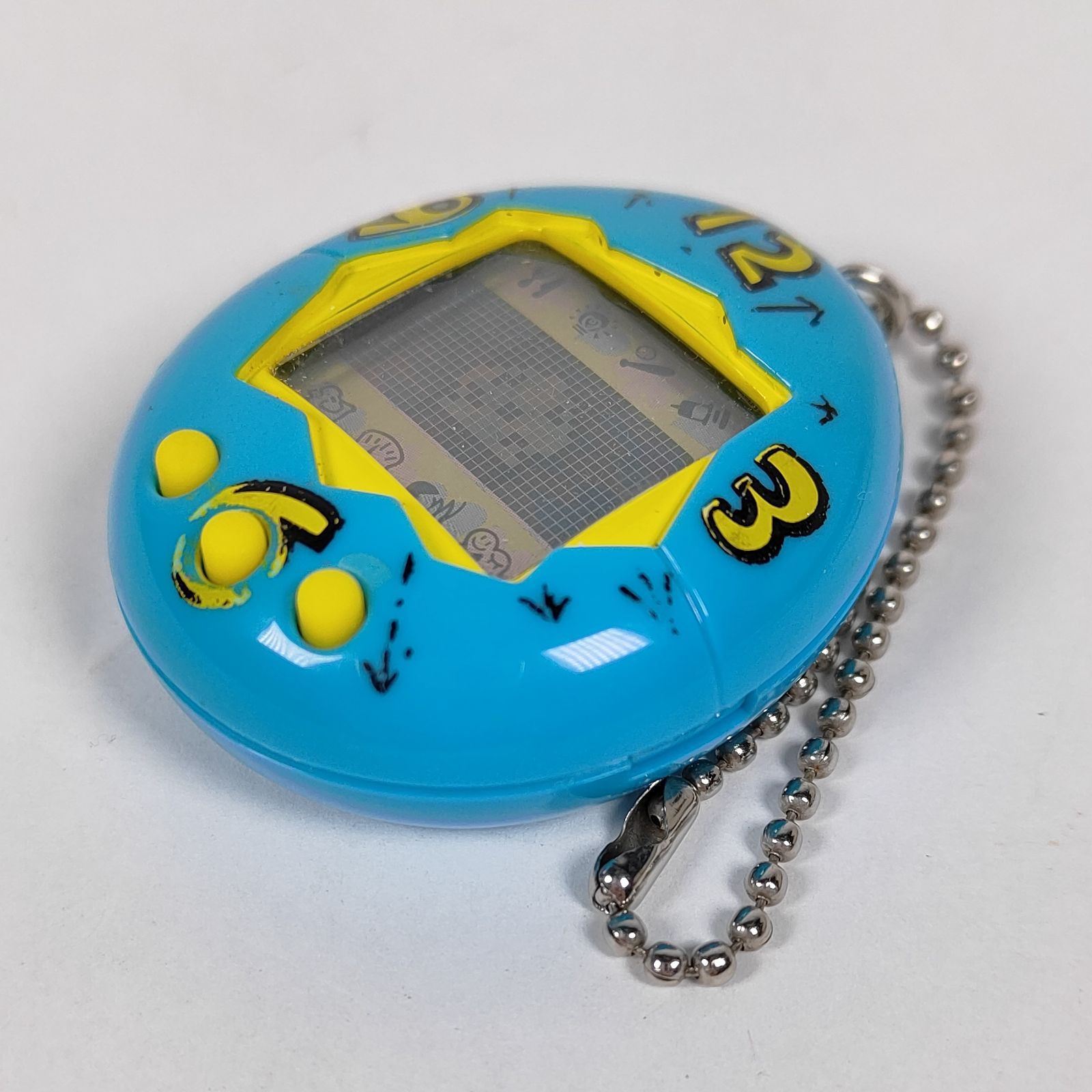 ☆ バンダイ 初代 たまごっち 水色（時計柄）香港版 ☆ - メルカリ