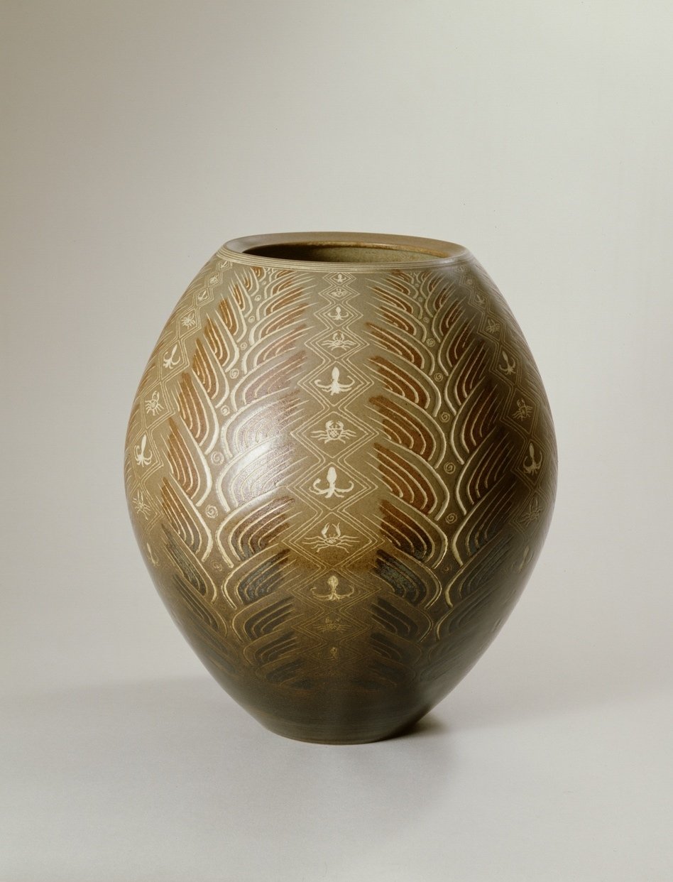 波間に浮かぶタコとカニ。確かな技術が可能にした 三代 井上良斎 の