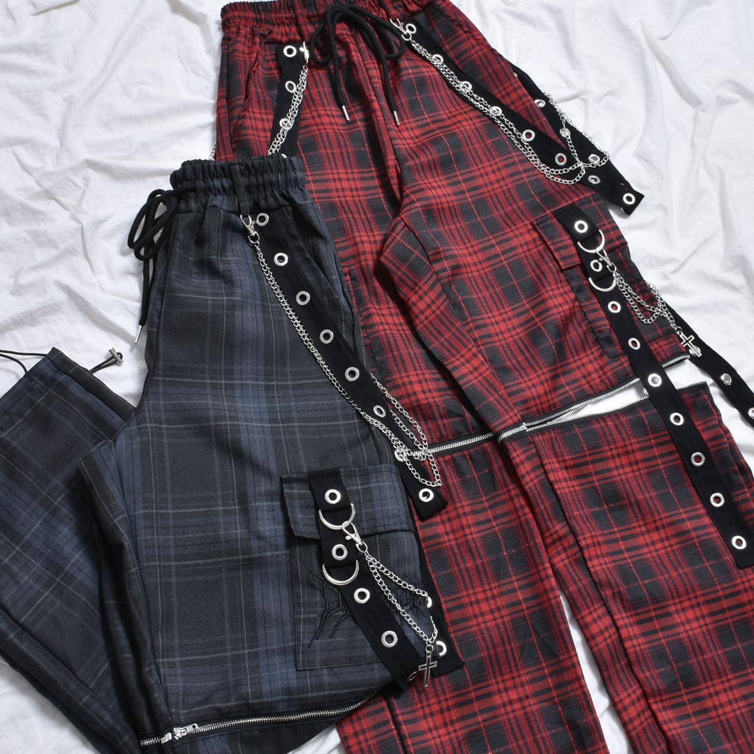 渋谷店で人気！】サブカルロゴ ZIPチェックハトメパンツ