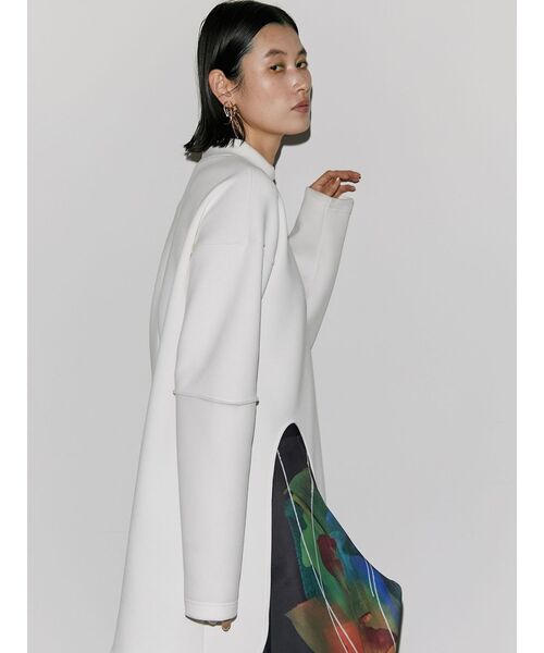 UN3D.（アンスリード）の「カーブスリットトップス（Tシャツ