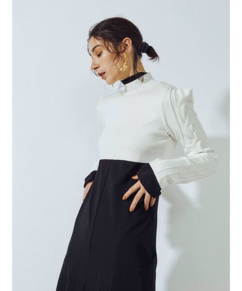 UN3D.（アンスリード）の「ケーブルスリーブショートニットトップ