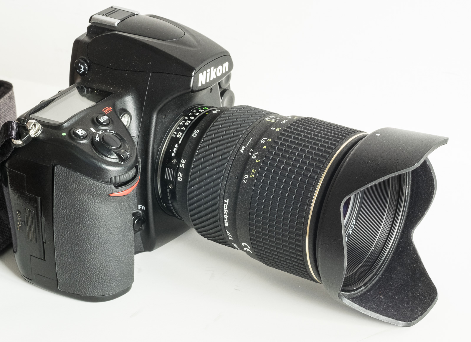 The four Tokina 28-70 AF lenses and their Angenieux roots