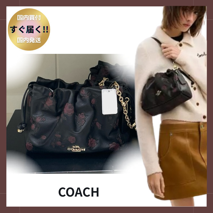 COACH】フェイ ドローストリング バッグ・フローラル プリント (Coach