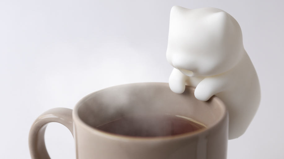 This adorable little robot cat will stop you burning your tongue