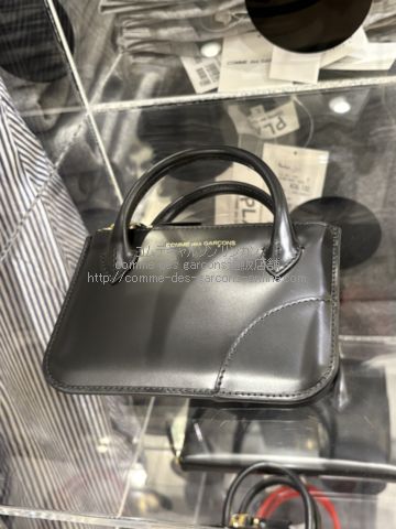 コムデギャルソン “HANDLES”黒-ポーチ型財布・小銭入れ・コインケース