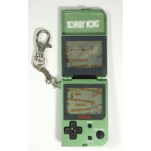 A Nintendo Game and Watch (Donkey Kong Jr,, Model DJ-101) handheld