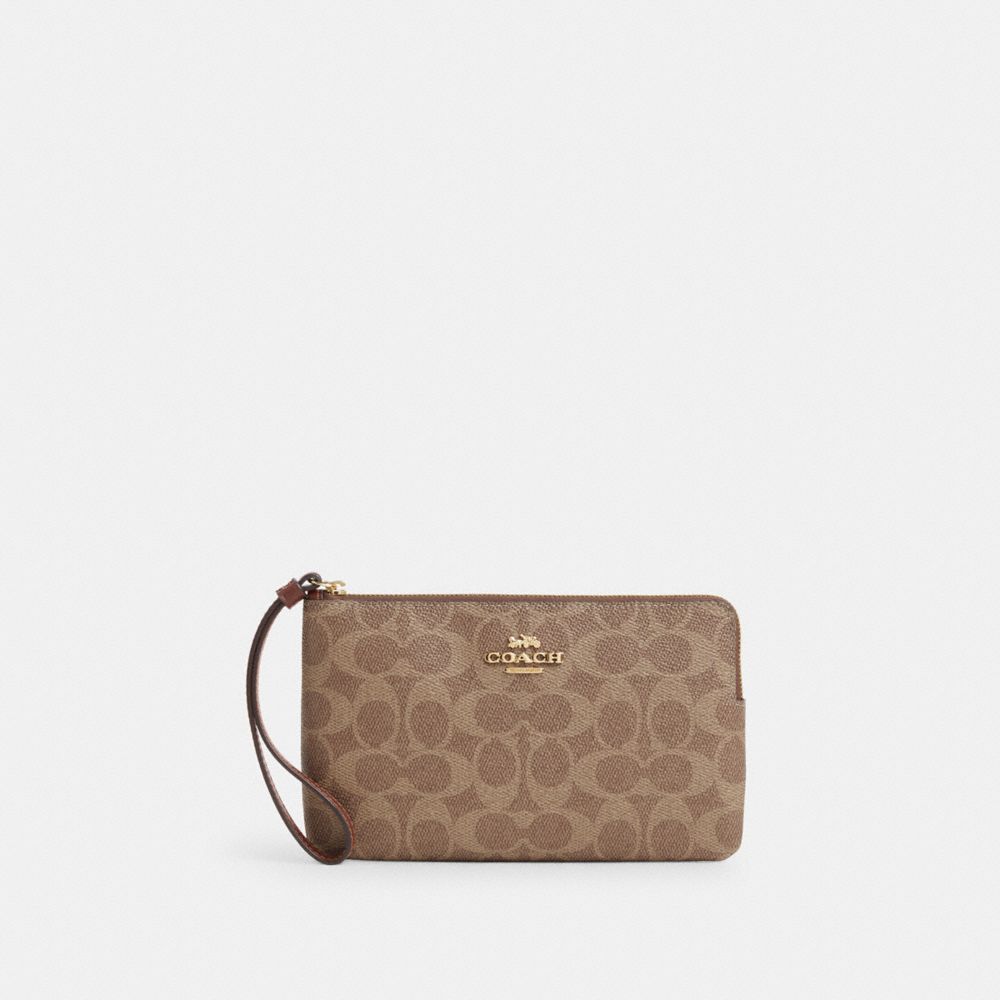COACH® DK | Large Corner Zip Wristlet In Signature Canvas