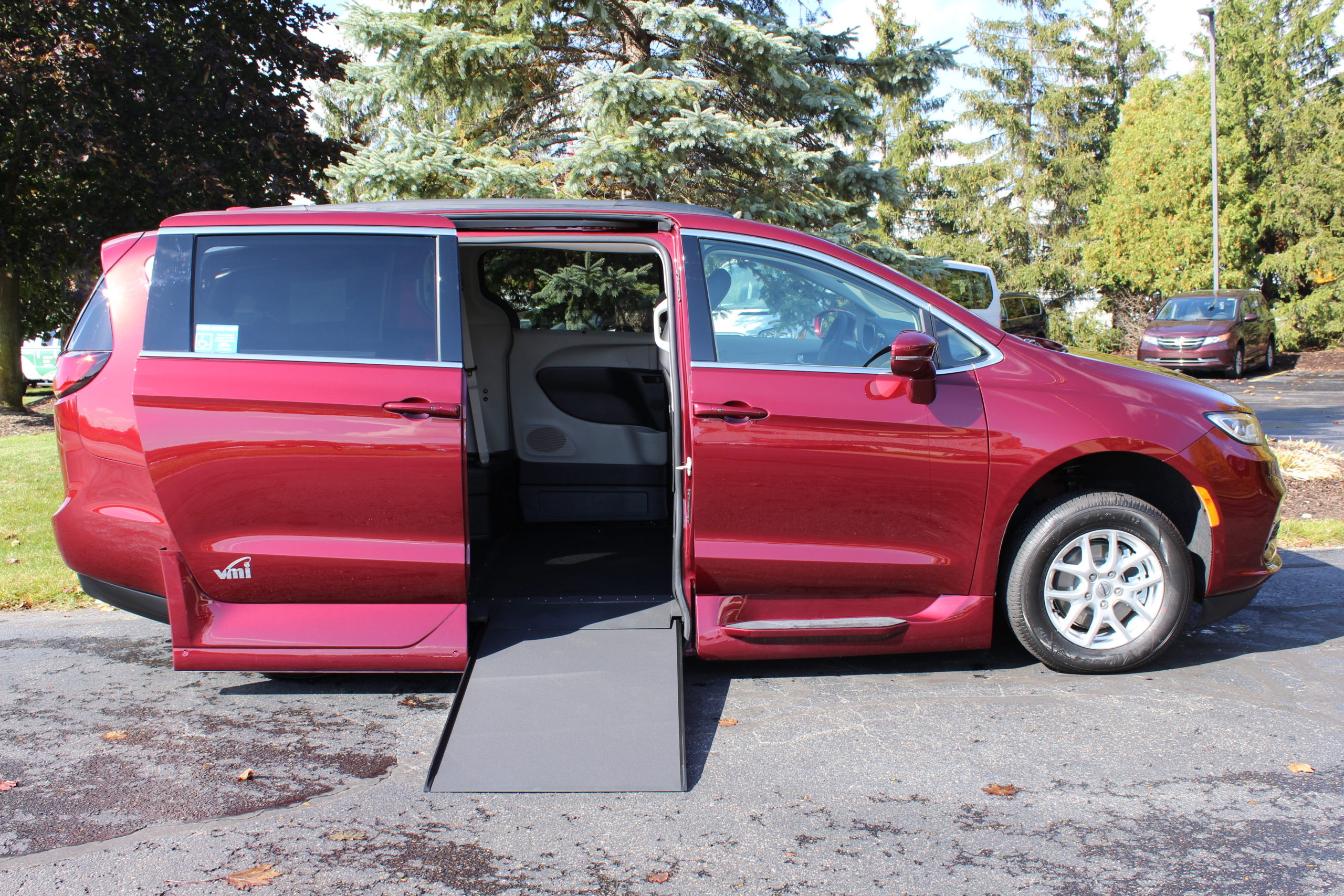 2022 Velvet Red Chrysler Pacifica Touring L with VMI Northstar