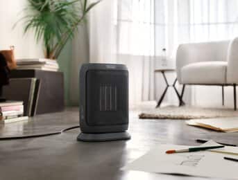 DeLonghi Compact Ceramic Heater with Remote HFX42T15GI | De'Longhi US