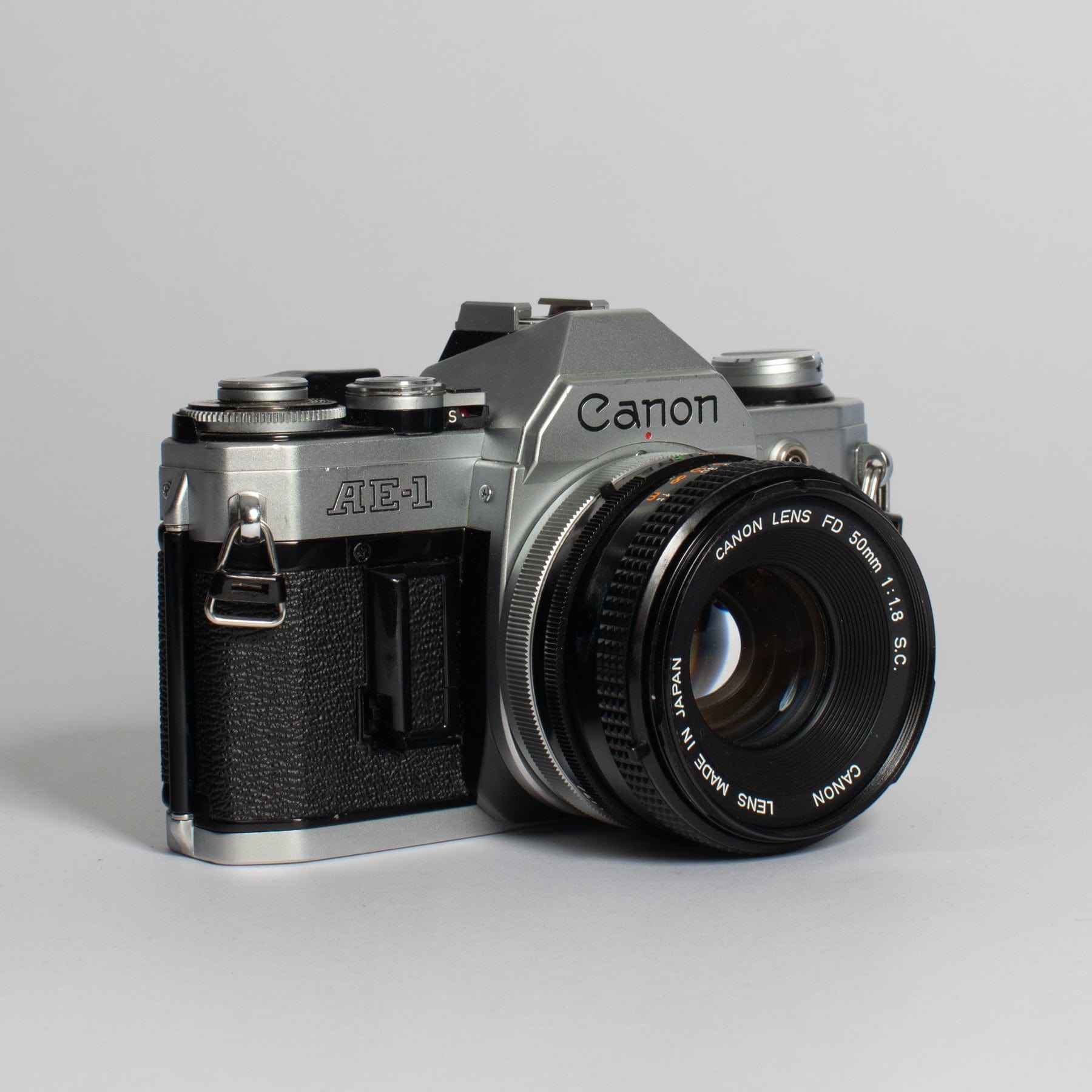 Canon AE-1 w/ 50mm FD f/1.8 & 135mm FD f/3.5 Lens – Film Supply Club