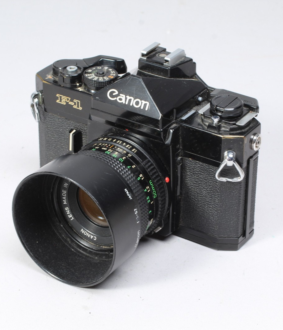 CANON F1 W 50MM F/1.8 FD LENS, HOOD, FLASH MOUNT & CAP SHUTTER