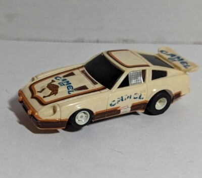 VINTAGE TYCO CAMEL DATSUN 280-ZX 440X2 CHASSIS HO SLOT CAR RUNS