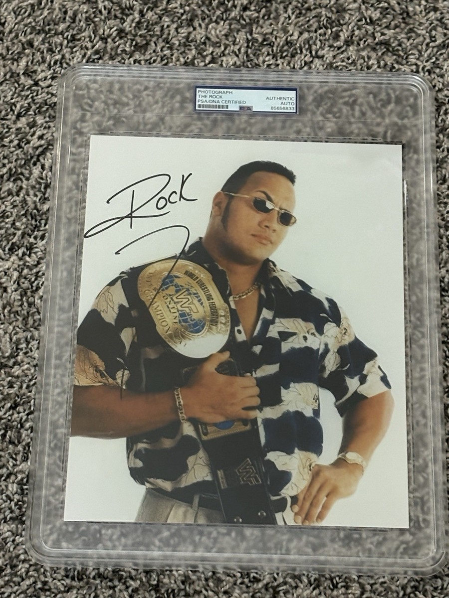 THE ROCK” DWAYNE JOHNSON SIGNED AUTOGRAPHED 8X10 WWE PHOTO PSA/DNA