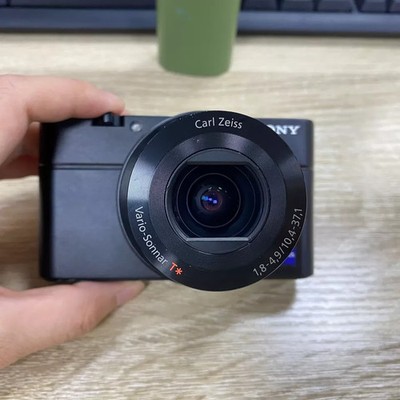 Sony Cyber-shot DSC-RX100 20.2MP Digital Camera - Black Includes