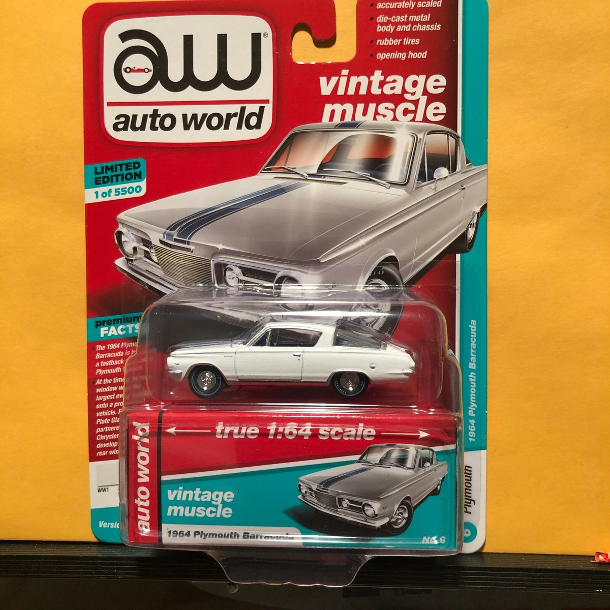 1/64 AUTO WORLD VINTAGE MUSCLE 1964 PLYMOUTH BARRACUDA WHITE WITH