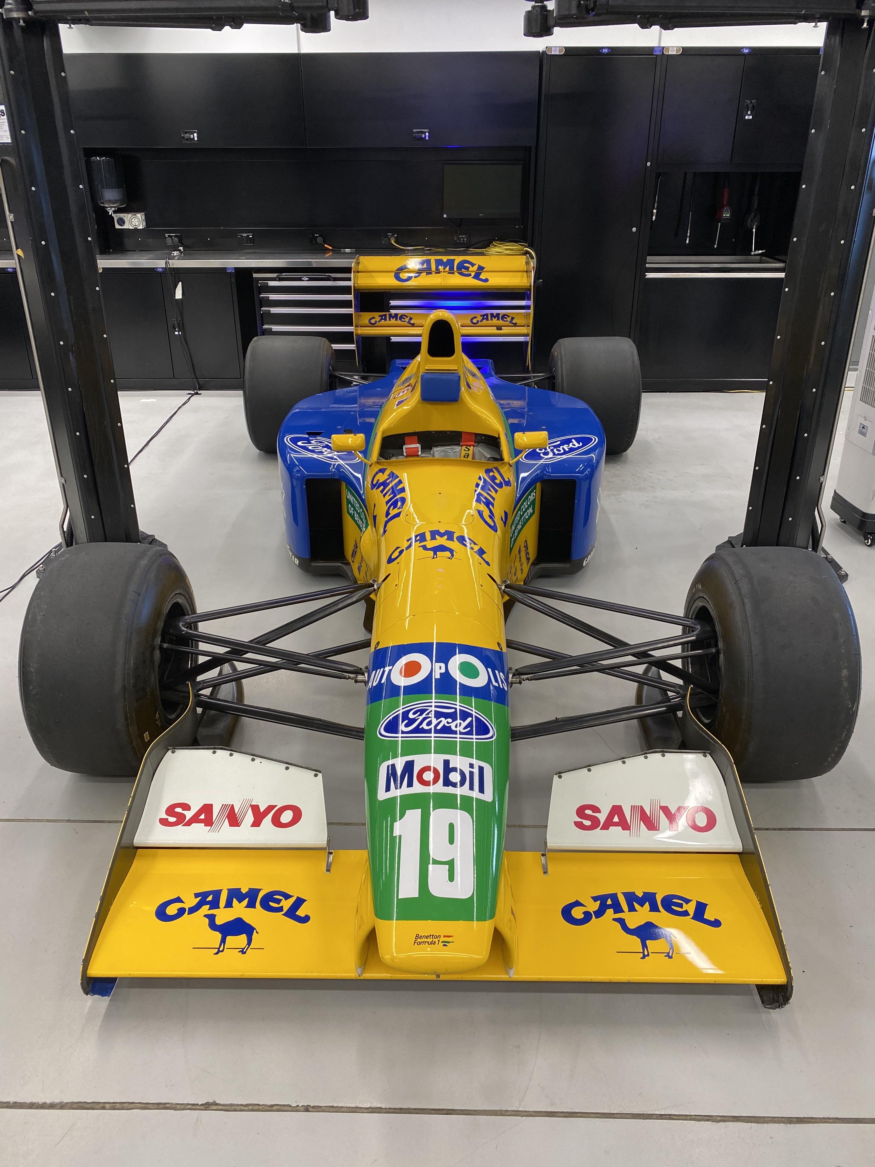 Michael Schumacher's 1991 Benetton B191 and Denny Hulme's McLaren