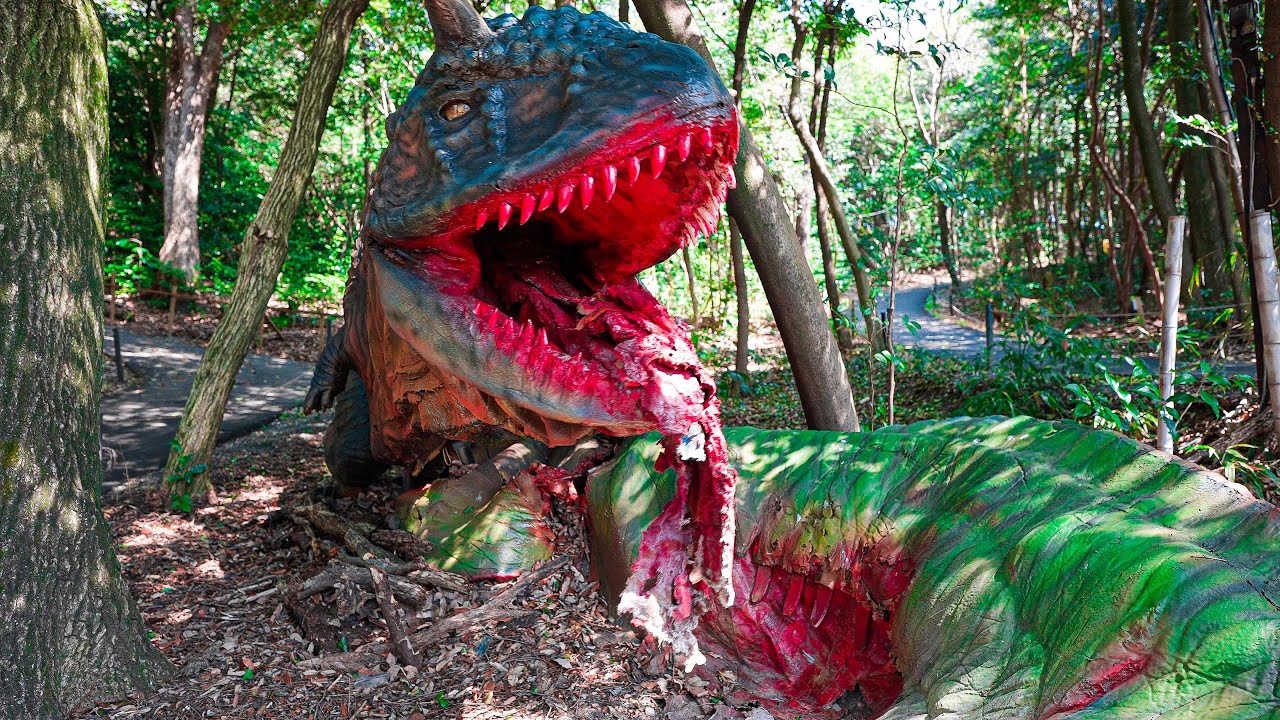 An eight-metre-long artificial dinosaur appears, walking and