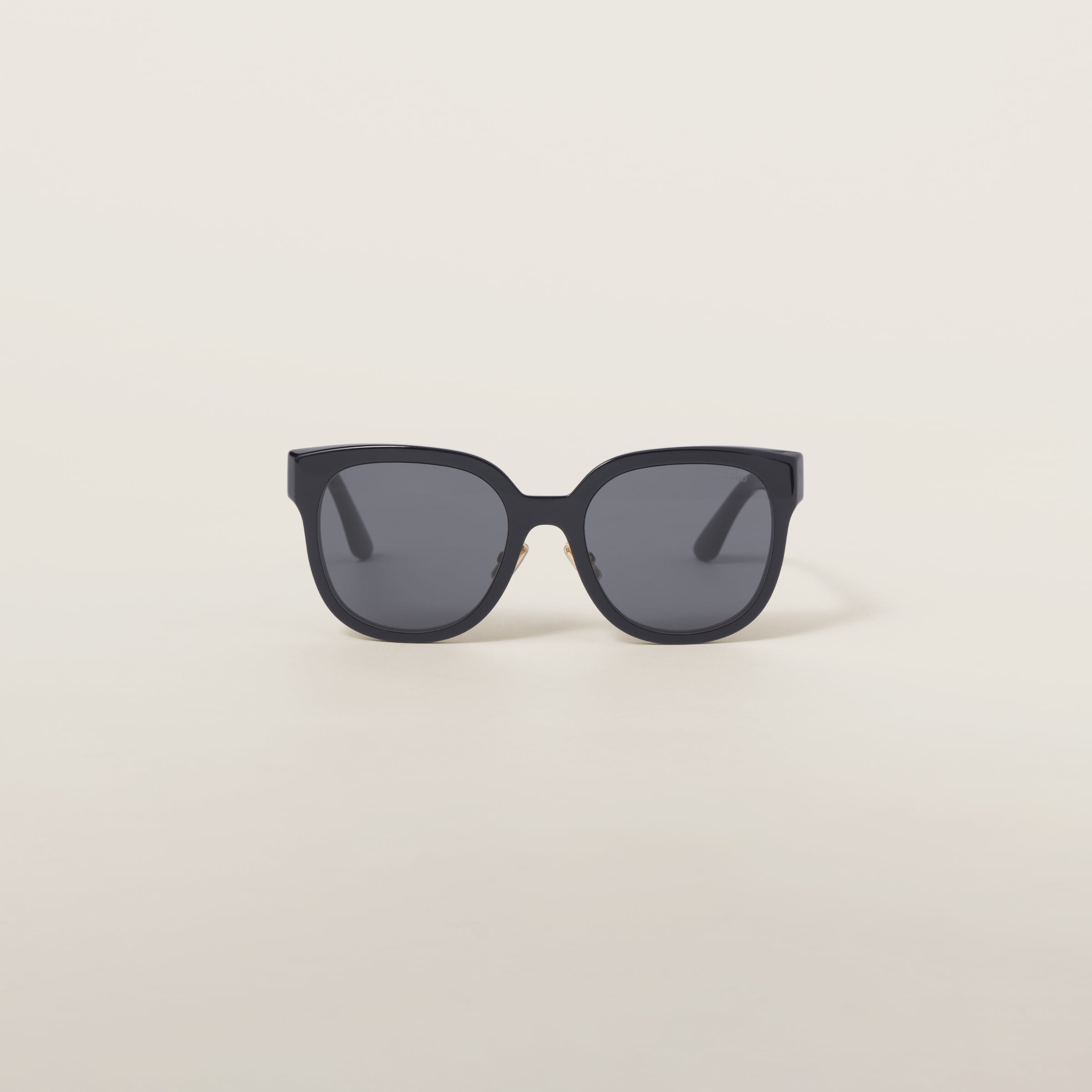 Miu Miu Miu Miu Logo sunglasses | REVERSIBLE