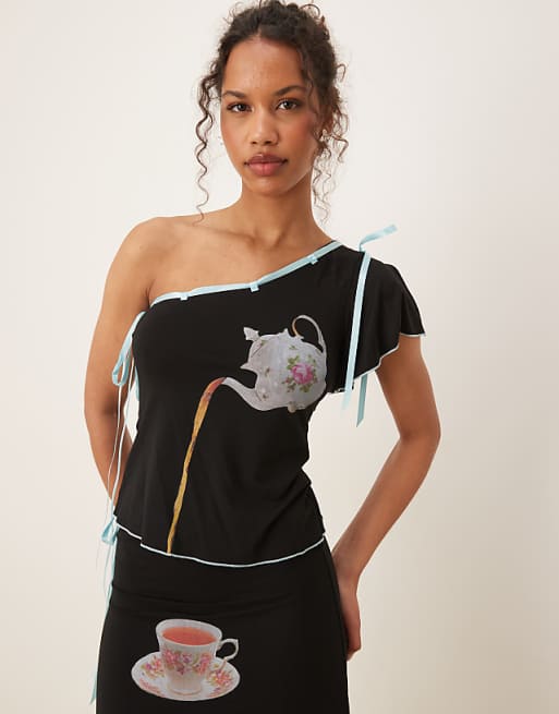 Tyler McGillivary alice tea motif ribbon top in black - part of a