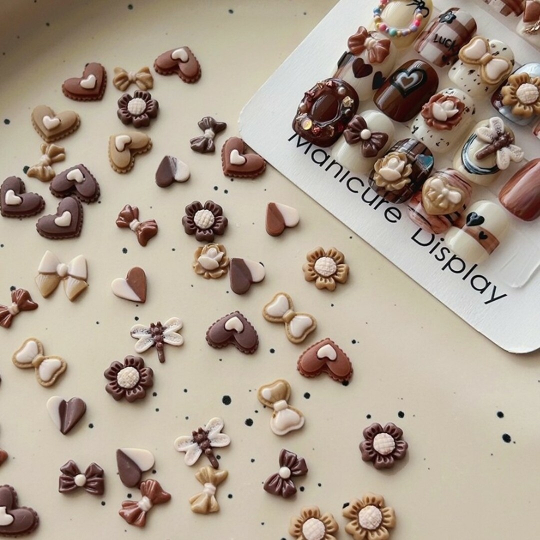 ネイルパーツ チョコレート バレンタインネイルデコパーツの通販 by K