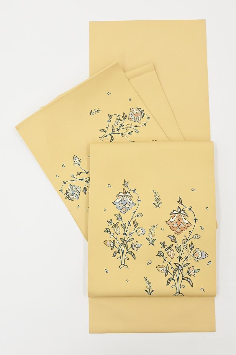 銀座【H-0866】塩瀬地 開き染名古屋帯 玉蜀黍色 唐花文（三越扱い