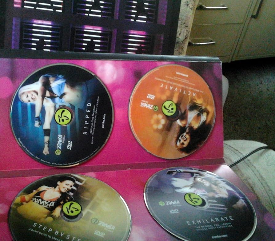 Amazon.com: Zumba Fitness Exhilarate Workout Routine 7 Dvds Box