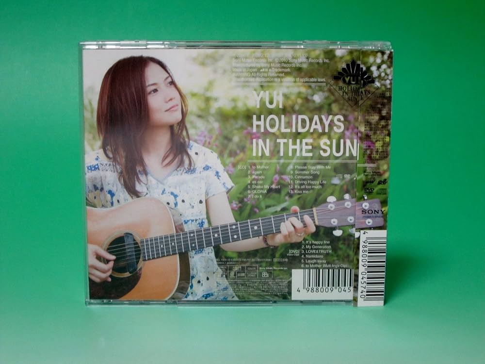 Amazon.co.jp: HOLIDAYS IN THE SUN【初回生産限定盤】CD+DVD - YUI