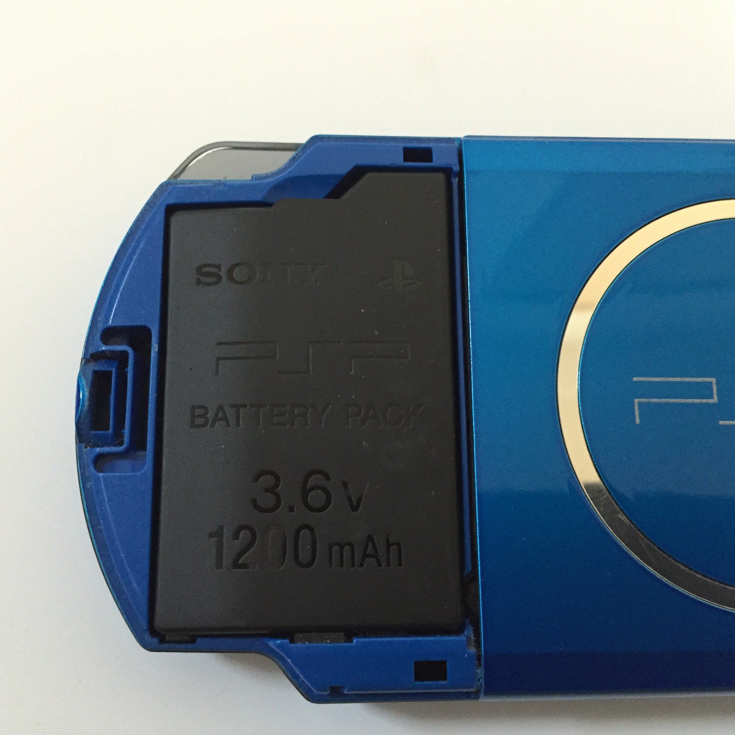 PSP-3000 ブルー 裏蓋無しジンオウガ ストラップ、メモリースティック