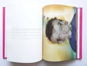 Amazon.co.jp: 洋書イヴ・サンローラン 40周年記念 写真集 本 作品