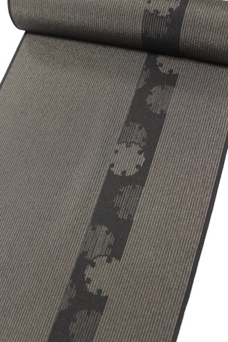 本しぼ絣十日町お召し「伝統工芸士白川貞夫謹製 柿渋染 よろけ縞