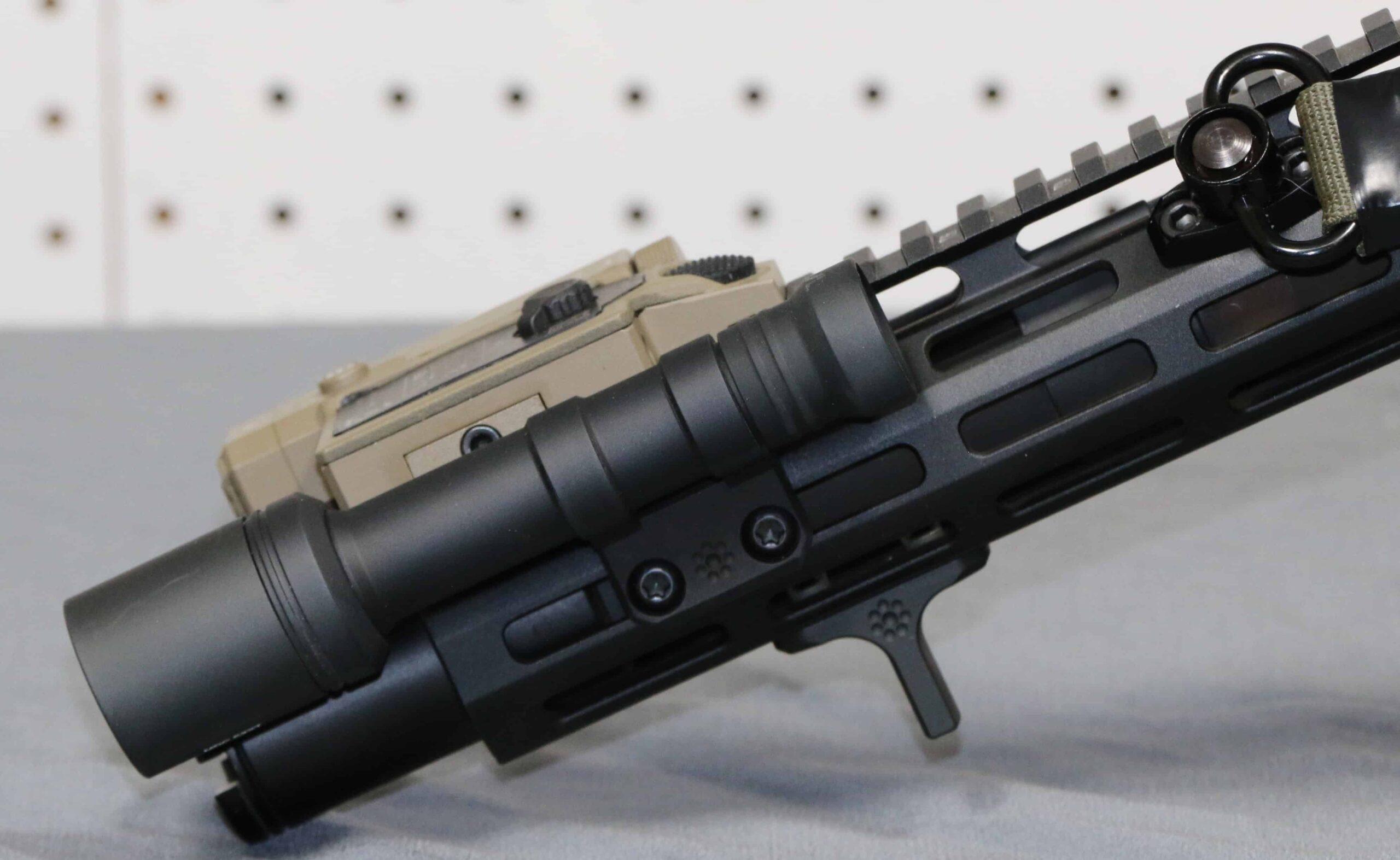 Arisaka Defense 600 Series light with Malkoff E2XT head - Mid