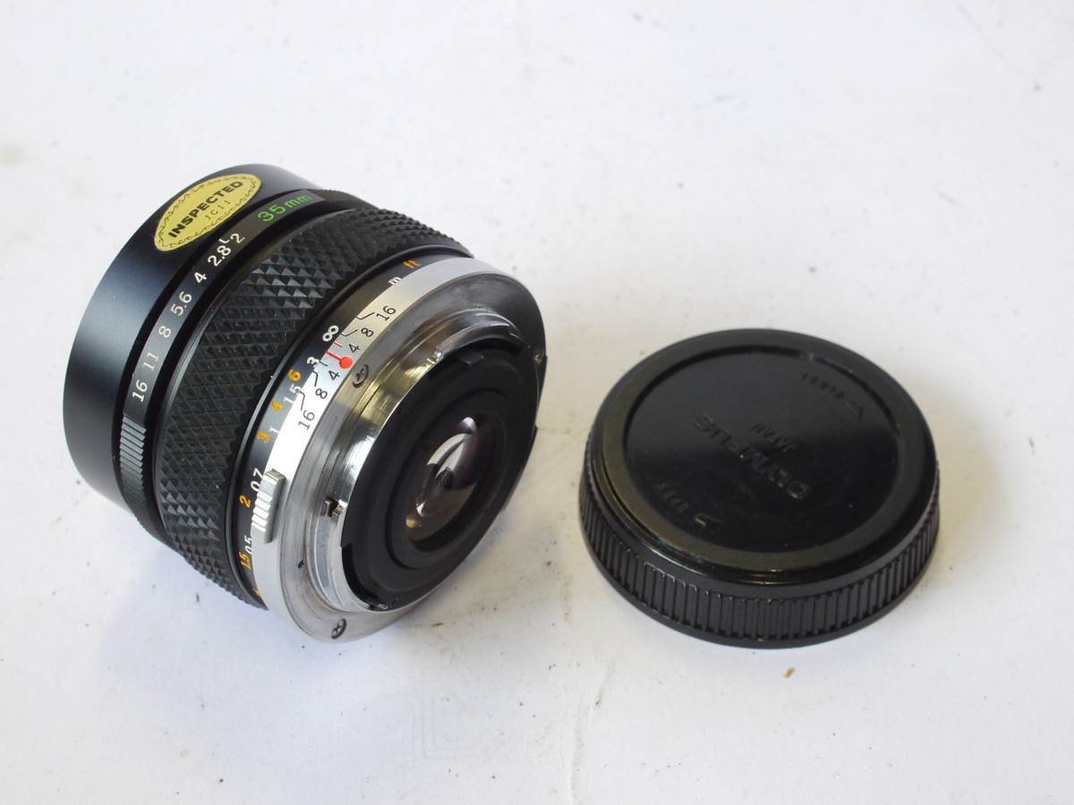 Olympus 35mm f2 Zuiko MC OM mount lens + Olympus caps & case – MW