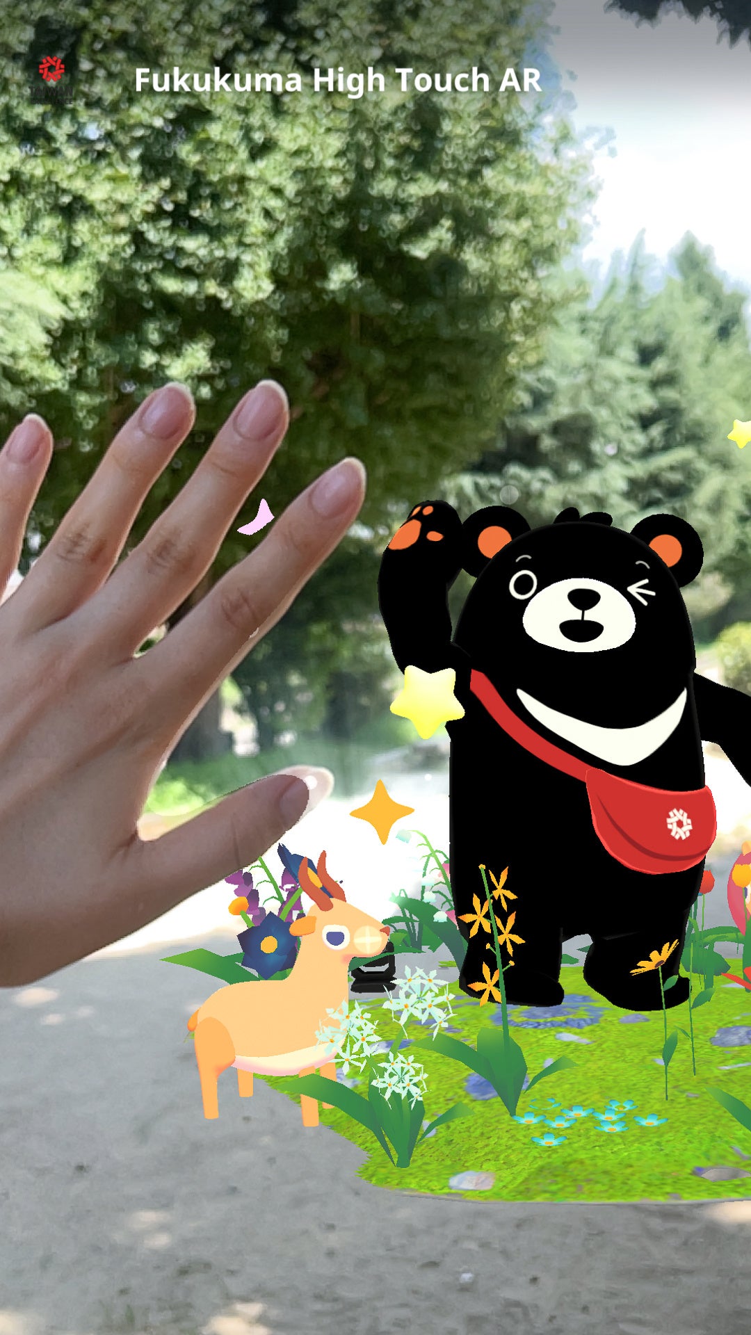 台湾エクセレンスの「福熊」とハイタッチで、1回10円の寄付に！自然と